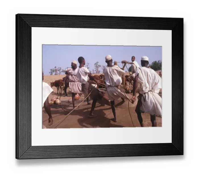Framed Print : Life in the Sahel region of northern Nigeria, west Africa, early 1980s - men drawing water from a well