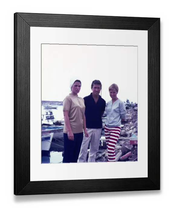 Framed Print : A man and two women fashionably dressed standing next to boats on holiday in Spain, 1966 Framed Print : A man and two women fashionably dressed standing next to boats on holiday in Spain, 1966