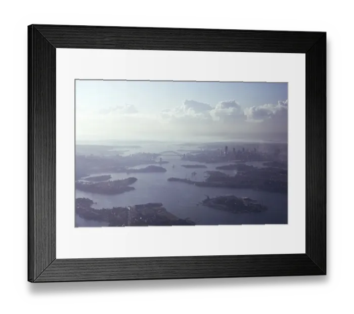 Framed Print : Oblique aerial view of the harbour, the bridge and the city centre skyline, Sydney, Australia 1974 Framed Print : Oblique aerial view of the harbour, the bridge and the city centre skyline, Sydney, Australia 1974