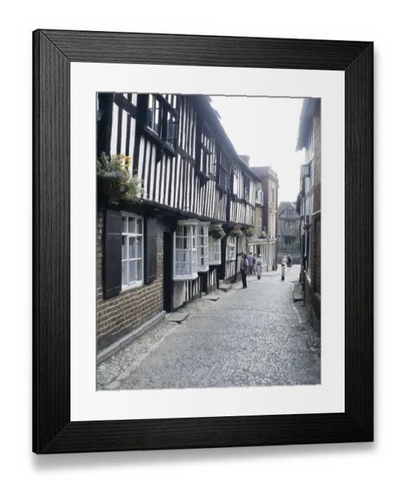 Framed Print : Historic half-timbered houses in a cobbled street, Ledbury, Herefordshire, England, UK 1970s