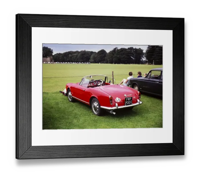 Framed Print : Red Alfa Romeo Spider 1600 at a polo match Cirencester, Gloucestershire, England, UK around 1967