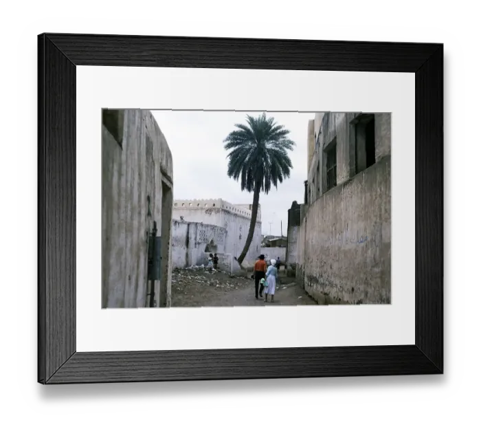 Framed Print : Historic buildings in the ancient city of Zebid, Zabid, Yemen 1998 UNESCO World Heritage Site Tourists explore streets