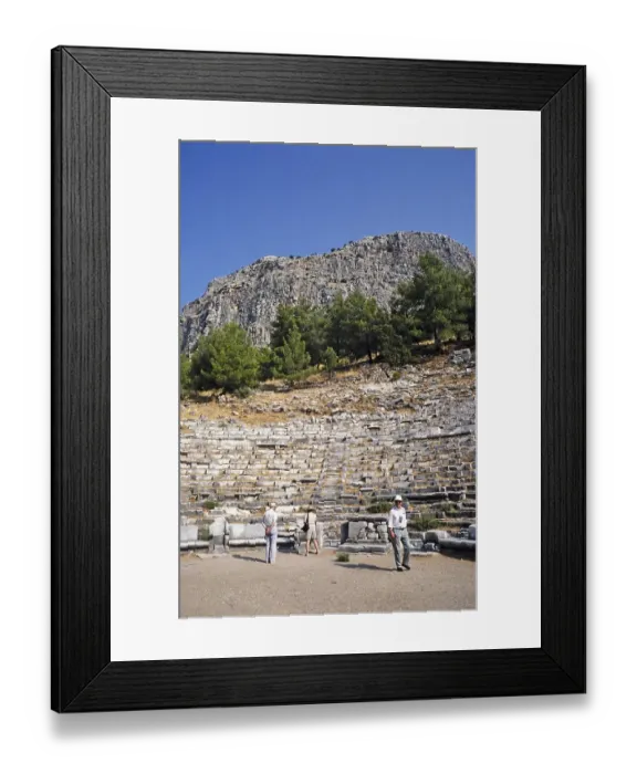 Framed Print : Archaeological site Ruins of the ancient Greek city of Priene, Turkey, 1997 Tourist group in the amphitheatre, Asia Framed Print : Archaeological site Ruins of the ancient Greek city of Priene, Turkey, 1997 Tourist group in the amphitheatre, Asia