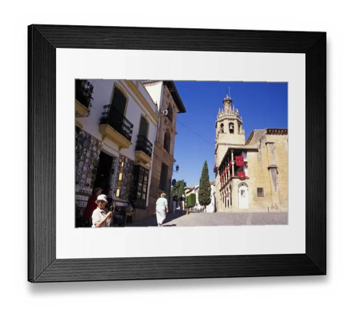 Framed Print : Elderly British tour group exploring the historic old town by the cathedral in Ronda, Andalusia, Spain, Europe
