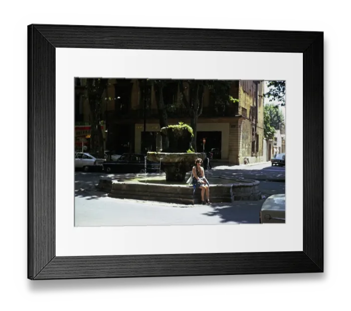 Framed Print : Woman at a fountain in the historic centre of Aix en Provence, France 1974
