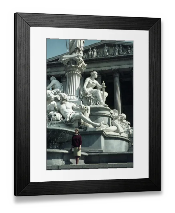 Framed Print : Young woman standing by statue of Pallas Athene, Vienna, Austria, early 1960s, Europe