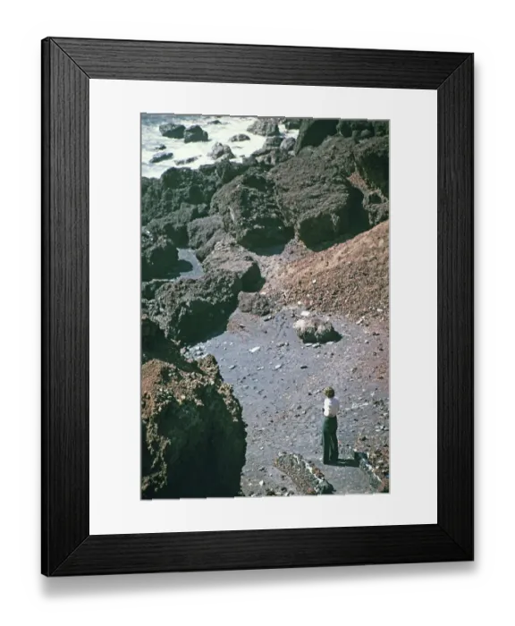 Framed Print : Frau am Strand mit Vulkangestein und Lavastroemen, Lanzarote, Kanarische Inseln, Spanien, 1979