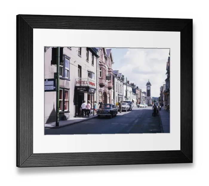 Framed Print : People and cars on the street at the Lion Royal Hotel in Rhayader, Radnorshire, Powys, Central Wales, 1964