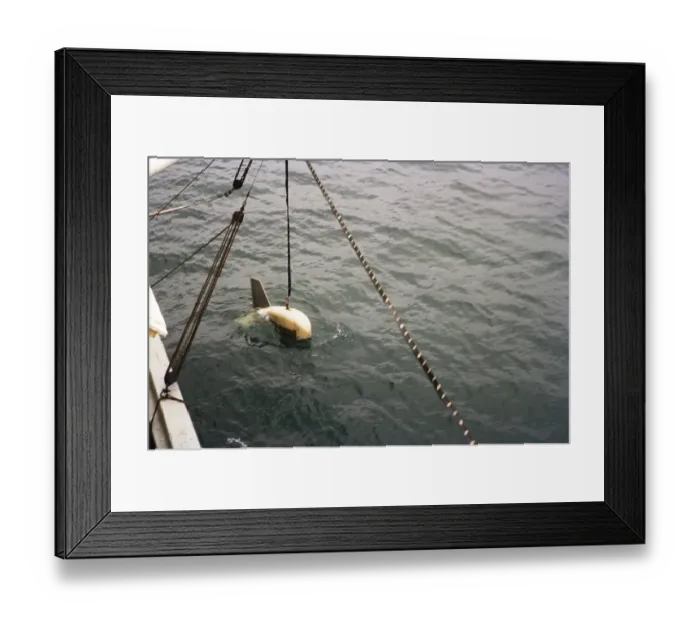 Framed Print : Floating device for scientific investigation of the seabed Echosounder Acoustics lowered into the sea Weymouth, England 1963