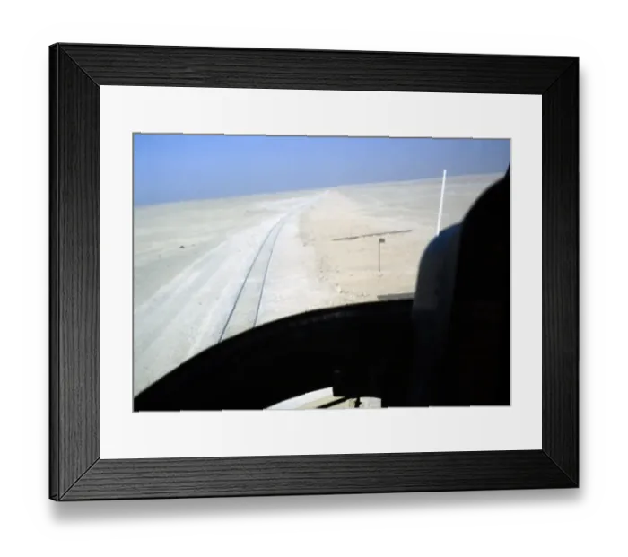 Framed Print : View from the cockpit of a helicopter over railway tracks in the desert, Saudi Arabia 1979 Framed Print : View from the cockpit of a helicopter over railway tracks in the desert, Saudi Arabia 1979