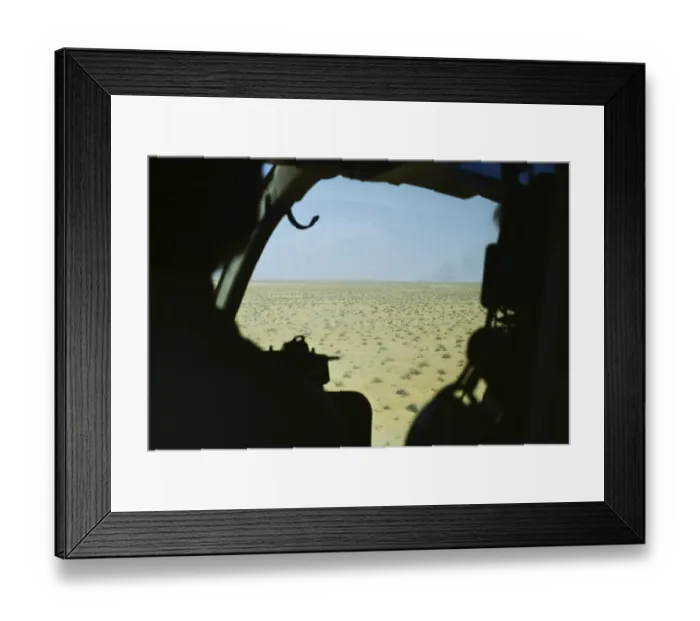 Framed Print : View into the cockpit of a Bell 206 JetRanger helicopter over the Arabian desert, Saudi Arabia oil industry 1979
