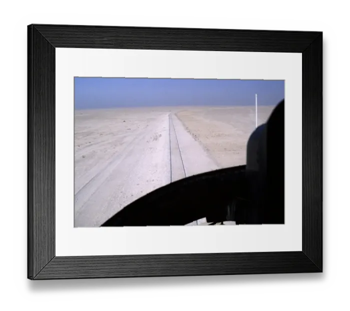 Framed Print : Oil industry Saudi Arabia, helicopter Bell 206 JetRanger 1979 Pilot in cockpit view of desert railway Framed Print : Oil industry Saudi Arabia, helicopter Bell 206 JetRanger 1979 Pilot in cockpit view of desert railway