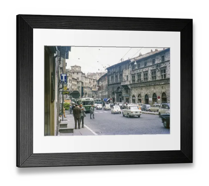 Framed Print : Traffic and trams on a busy street in Perugia, Umbria, Italy 1969