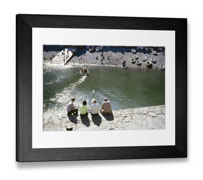 Framed Print : Sitting people at the harbour, Clovelly, North Devon, England, Great Britain September 1968