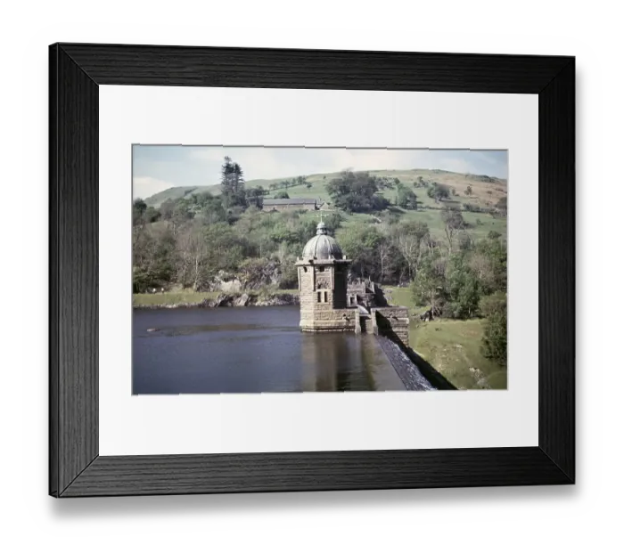 Framed Print : Water flowing over the dam wall from the reservoir, Pen y Garreg, Elan Valley, Rhayader, Powys, Wales, UK 1959