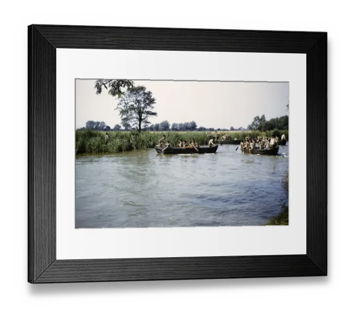 Framed Print : Students taking part in military exercises as army cadets, South of England, United Kingdom, late 1950s, paddling in boats on a river, Europe