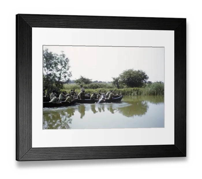 Framed Print : Students taking part in military exercises as army cadets, South of England, United Kingdom, late 1950s, paddling in boats on a river, Europe
