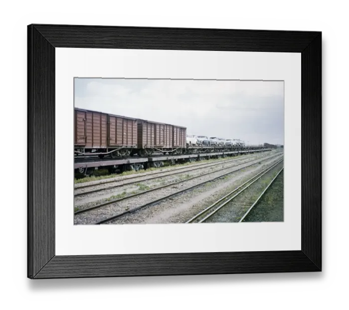 Framed Print : Transport of railway freight wagons and wagons with a piggyback transporter, Australia 1956, due to different track gauges