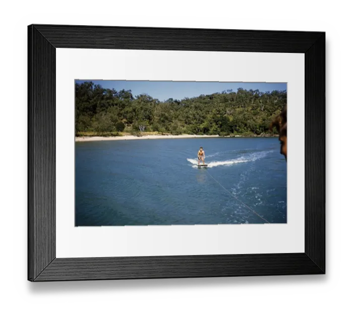 Framed Print : Melbourne Grammar School expedition to Queensland, Australia, 1956, probably a boy water skiing on the Whitsunday Islands, Oceania Framed Print : Melbourne Grammar School expedition to Queensland, Australia, 1956, probably a boy water skiing on the Whitsunday Islands, Oceania
