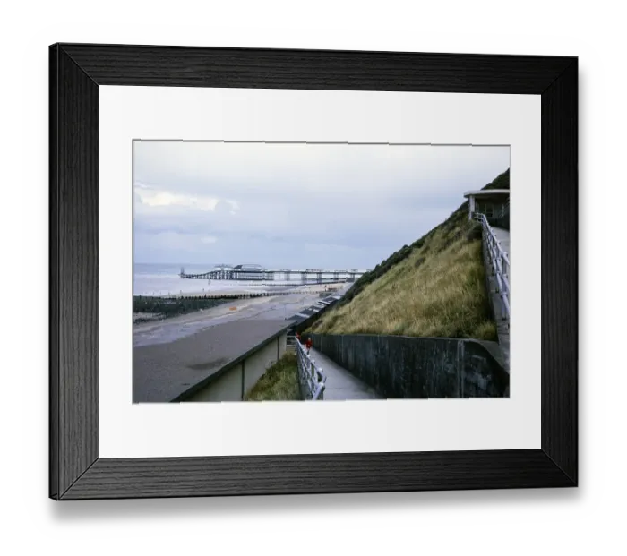 Framed Print : View from the cliff to the pier, Cromer, Norfolk, England, 1966 Framed Print : View from the cliff to the pier, Cromer, Norfolk, England, 1966