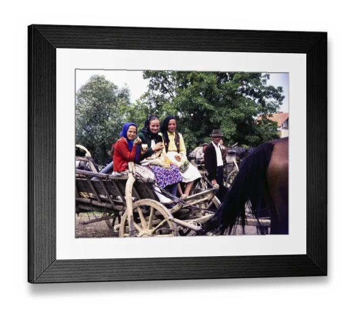 Framed Print : Women sitting on a horse-drawn cart and wearing traditional clothes, rural area, Romania, Eastern Europe 1967, Europe