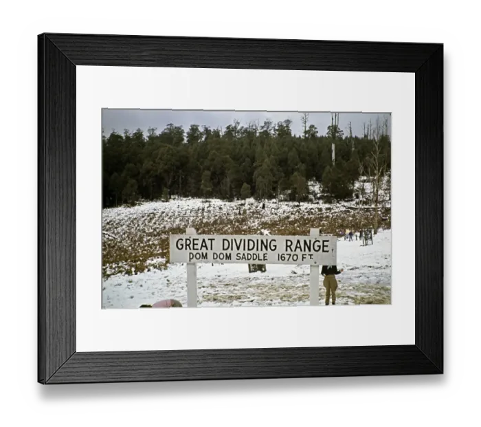Framed Print : Sign for Dom Dom Saddle of the Great Dividing Range, Victoria, Australia 1956 Children playing in the snow