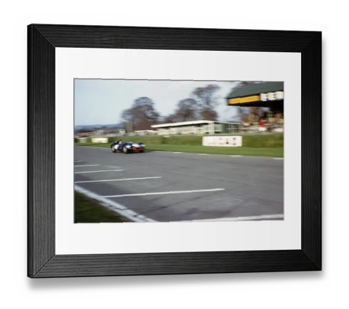 Framed Print : Blurred photo of British sports racing driver Bill de Selincourt (1921 2014) at the wheel of a Lister Jaguar Knobbly, BARC event at Goodwood, March 1961 Framed Print : Blurred photo of British sports racing driver Bill de Selincourt (1921 2014) at the wheel of a Lister Jaguar Knobbly, BARC event at Goodwood, March 1961