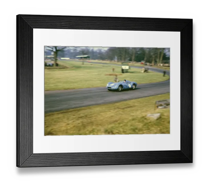 Framed Print : British sports racing driver Bill de Selincourt (1921 2014) at the wheel of a Lister Jaguar Knobbly, BARC race on the Oulton Park race track, Cheshire, England, 17 March 1962