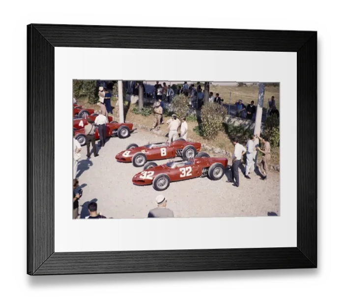 Framed Print : Ferrari Formula One Team in the paddock with shark nose Ferrari 156 F1 cars, Ferraris, Monza Grand Prix, Italy 1961 thought to be Baghetti talking to a mechanic on the right