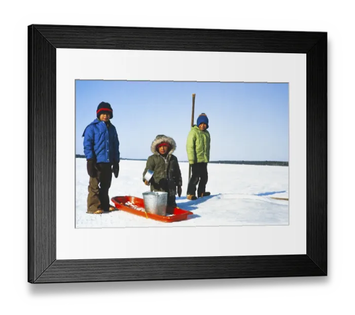 Framed Print : Ojibway community of Webequie First Nation, Eastwood Island, Northern Ontario, Canada 1978 Children collecting snow in buckets outside Framed Print : Ojibway community of Webequie First Nation, Eastwood Island, Northern Ontario, Canada 1978 Children collecting snow in buckets outside