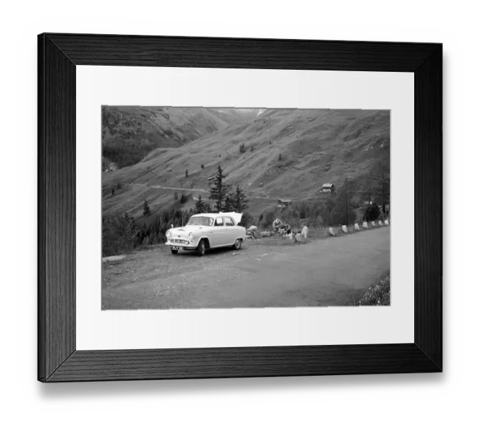 Framed Print : Picnic by British Austin Cambridge A40 car overland adventure trip 1956 on mountain road, Austria, Europe