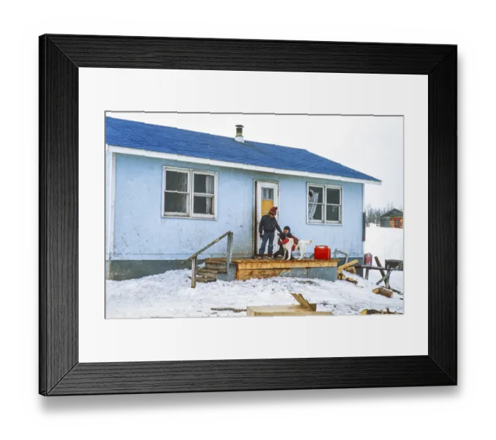 Framed Print : Webequie First Nation Ojibway community, Eastwood Island, Northern Ontario, Canada 1978 Children petting their dog in front of the house Framed Print : Webequie First Nation Ojibway community, Eastwood Island, Northern Ontario, Canada 1978 Children petting their dog in front of the house