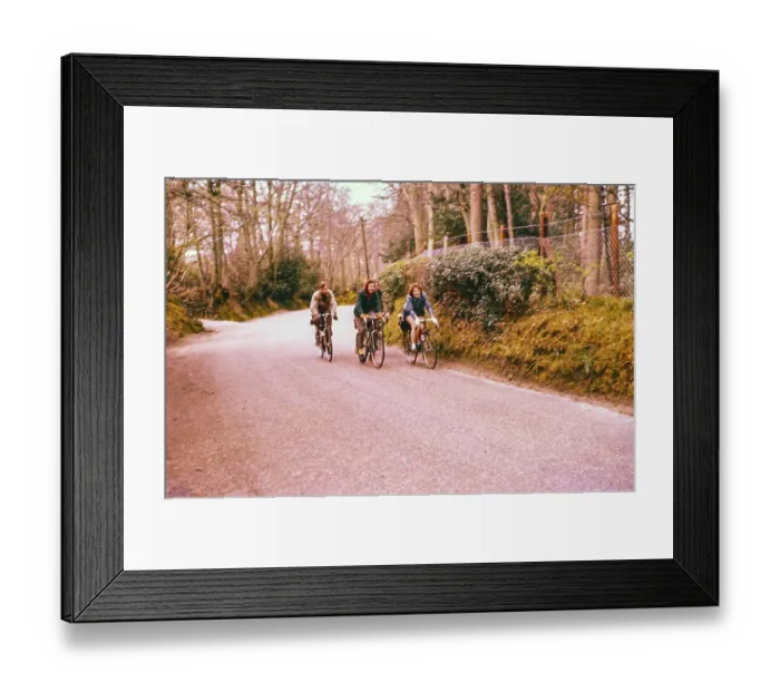 Framed Print : Four cyclists, two women, cycling on a country road, South of England, Great Britain 1957