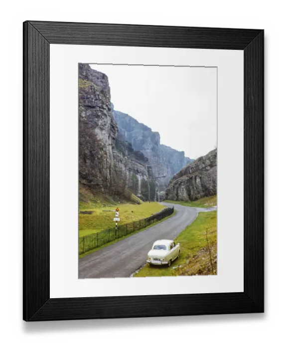 Framed Print : Blurred car Austin Cambridge, Cheddar Gorge, Somerset, England, UK 1950s