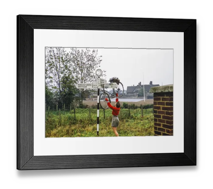 Framed Print : Cycling club ride in Kent, Mereworth, England, UK 1956 Woman cycling on road sign Framed Print : Cycling club ride in Kent, Mereworth, England, UK 1956 Woman cycling on road sign