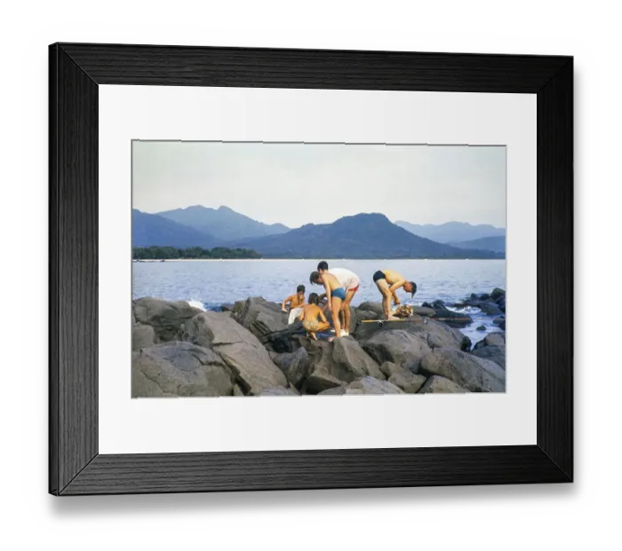 Framed Print : Emigrants from Europe, men and children fishing on rocks on the coast, Sierra Leone, West Africa 1963 1964, Africa