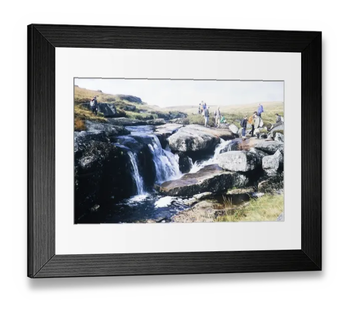 Framed Print : Hikers at the waterfall of the East Dart River, Dartmoor National Park, Devon, England, UK 1973