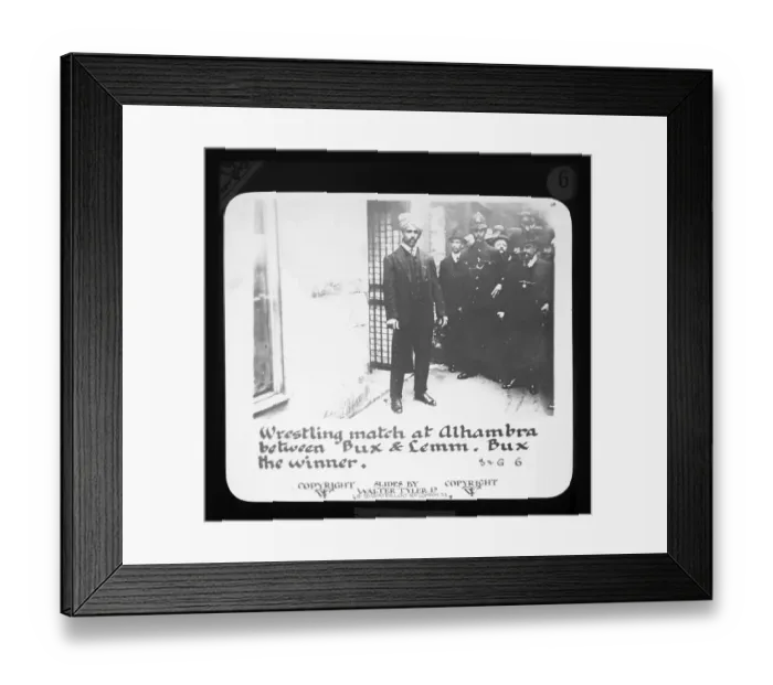 Framed Print : Wrestling match in the Alhmabra between Bux and Lemm, Bux wins, Laterna Magica by Walter Tyler Ltd. Alhambra Theatre, London, 5 September 1910