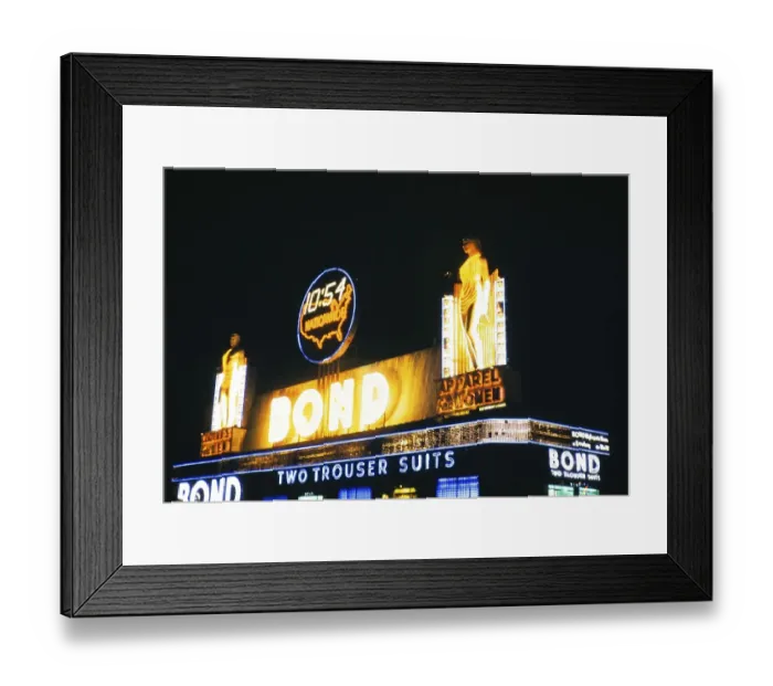 Framed Print : Neon light advert for Bond Two Trouser Suits, Times Square, New York, USA around 1953 Framed Print : Neon light advert for Bond Two Trouser Suits, Times Square, New York, USA around 1953