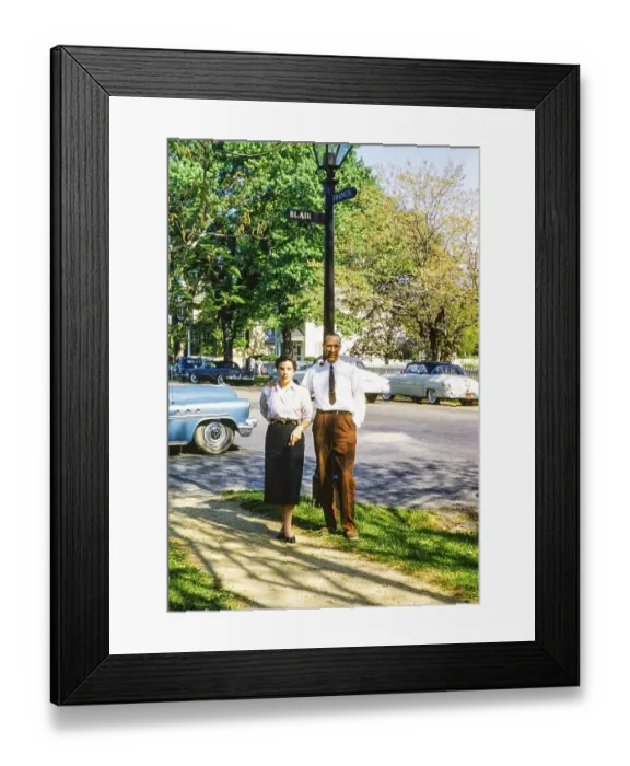 Framed Print : Full-length portrait of an elegantly dressed man and woman standing on the street next to a lamppost, Williamsburg, Virginia, USA, c. 1953 Man smoking a pipe, North America Framed Print : Full-length portrait of an elegantly dressed man and woman standing on the street next to a lamppost, Williamsburg, Virginia, USA, c. 1953 Man smoking a pipe, North America