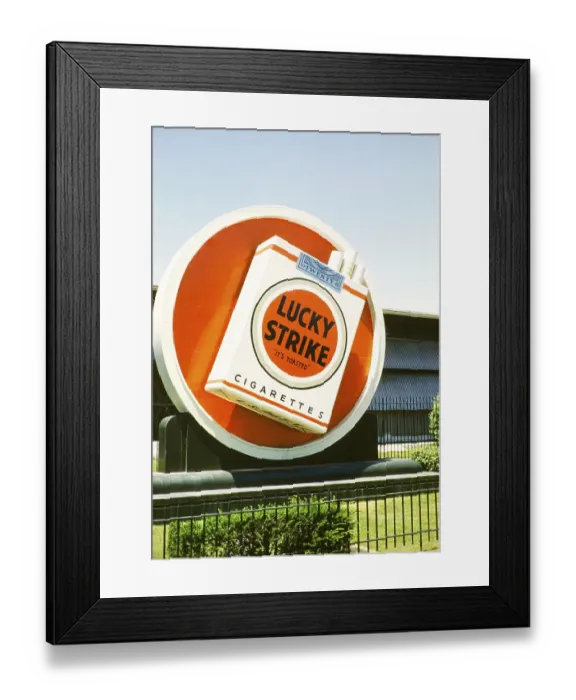 Framed Print : Lucky Strike cigarette advert, Philip Morris tobacco factory, probably in Durham, North Carolina. USA around 1953