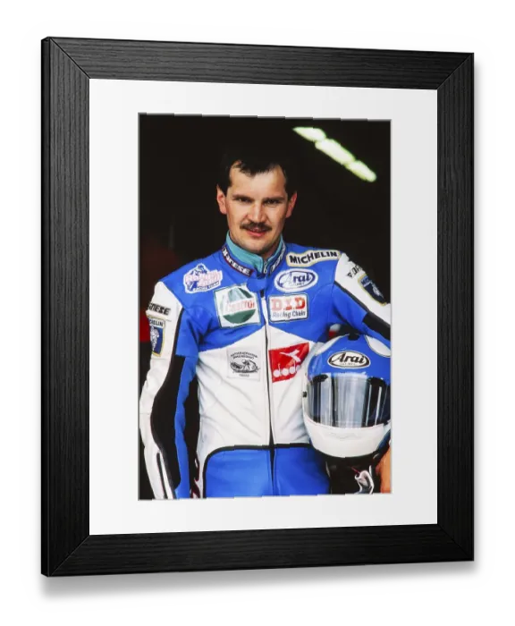 Framed Print : Racer Adi Stadler (DEU), portrait, Gemeinschaft Obing e. V. European Champion 1989, here at the Motorcycle World Championship 1990, rider in the 125 cc class, Grand Prix (GP) of Germany at the Hockenheimring on 27 May 1990, Germany, Europe