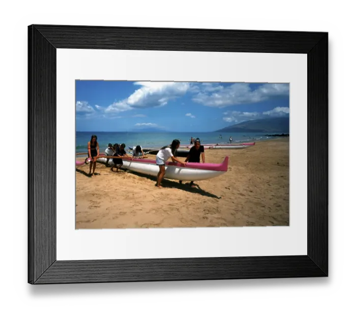 Framed Print : Kihei beach, an outrigger boat is pushed ashore by schoolgirls after physical education class, Maui Island, Hawaii, USA, North America