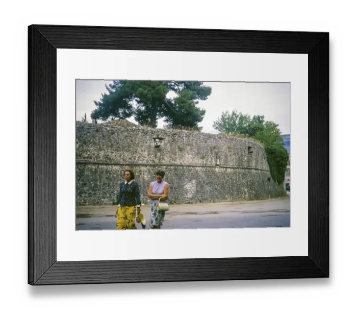 Framed Print : Two women walking in street, fortress stone city walls, Trebinje, Bosnia and Herzegovina, former Yugoslavia, Europe 1970, Europe
