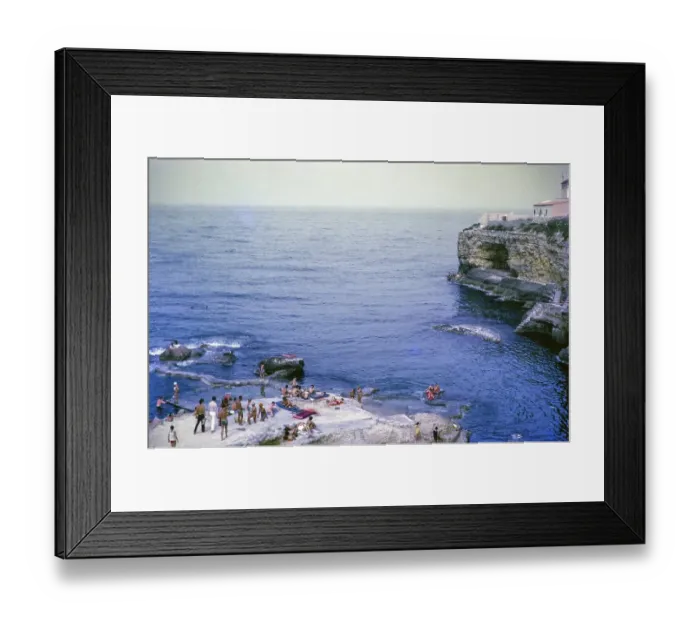 Framed Print : People sunbathing on rocky coastal ledge by Mediterranean Sea, Syracuse, Sicily, Italy, Europe 1969, Europe