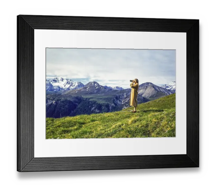 Framed Print : Woman standing on hillside using binoculars in mountains of national park, Western Rhaetian Alps, Switzerland, Europe 1959, Europe