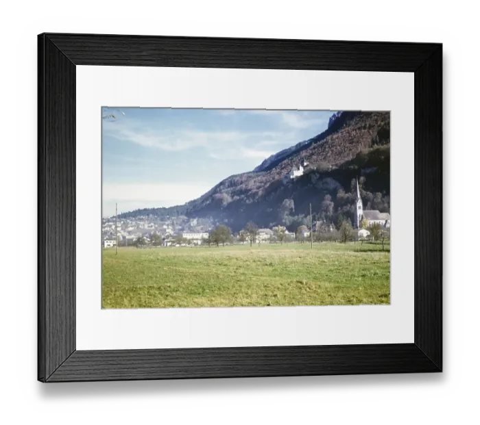 Framed Print : Vaduz Castle and St. Florin Cathedral, Vaduz, capital city of Liechtenstein, Europe 1960 Framed Print : Vaduz Castle and St. Florin Cathedral, Vaduz, capital city of Liechtenstein, Europe 1960