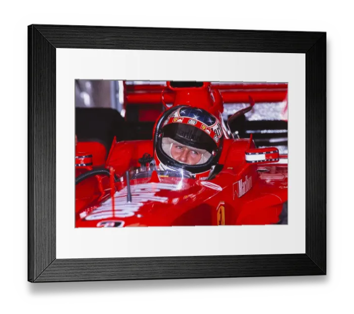 Framed Print : Formula 1 world champion Michael Schumacher sits in the cockpit of his Ferrari F399, German GP at the Hockenheimring, 1 August 1999 Framed Print : Formula 1 world champion Michael Schumacher sits in the cockpit of his Ferrari F399, German GP at the Hockenheimring, 1 August 1999