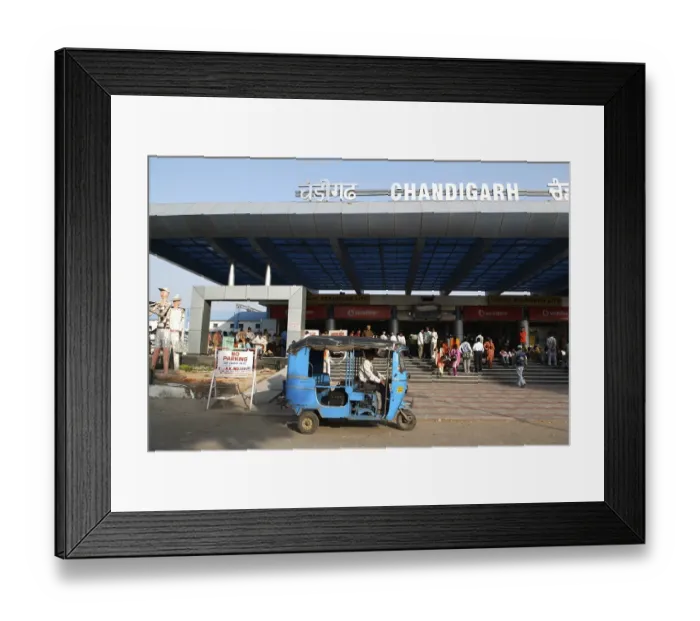 Framed Print : Blue auto rickshaw stand in front of Chandigarh railway station built in 1954, India Union Territory
