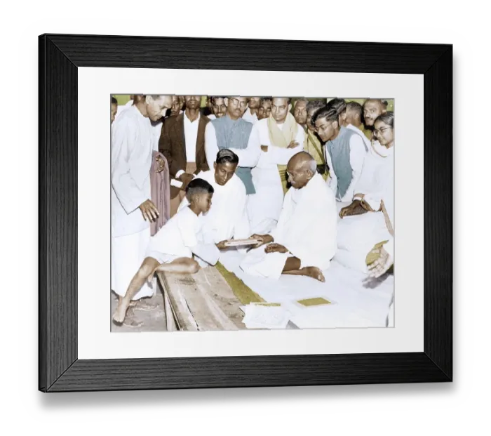 Framed Print : Mahatma Gandhi giving books to boy, India, Asia, 1946, Asia